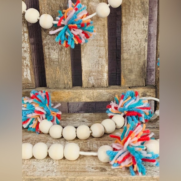 6 Foot Wood Bead Garland with Multi-Colored Yarn Pom Poms - Picture 2 of 9